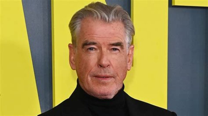 Pierce Brosnan is unrecognizable with long hair as he films scenes for