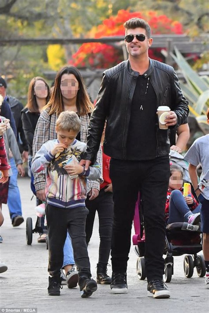 Robin Thicke enjoys a day at Disneyland with his son Julian Daily