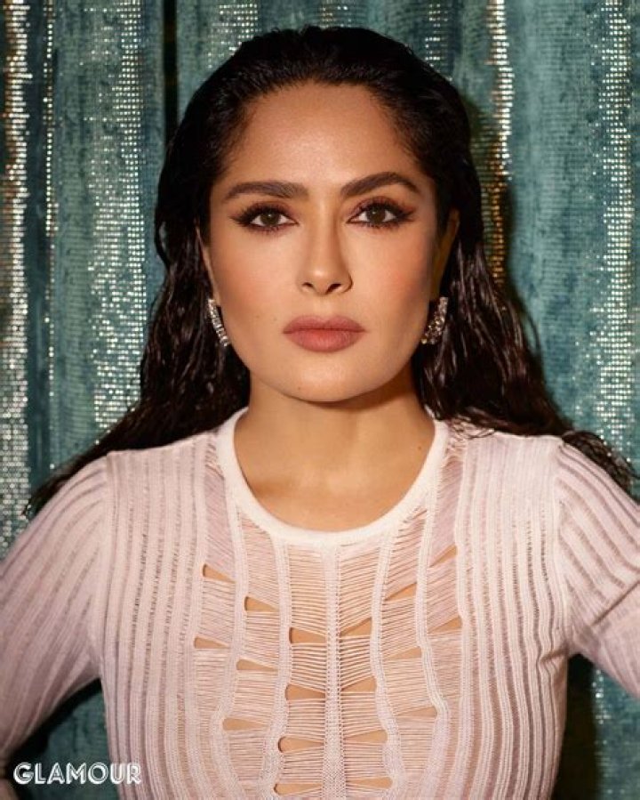 Salma Hayek Poses in Sparkling Dress & Gold Heels for Glamour’s Cover