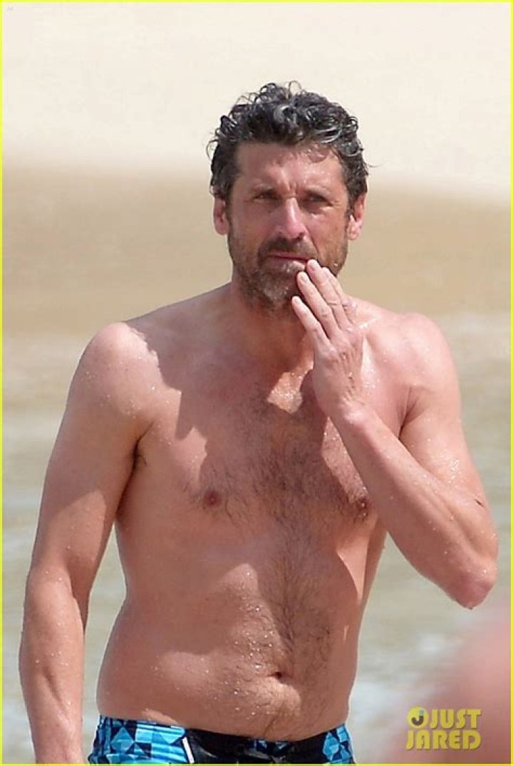 Shirtless Patrick Dempsey Continues His Beach Vacation with Wife