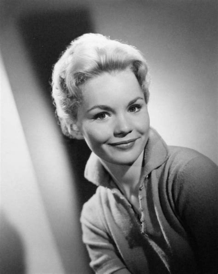 Tuesday Weld emerging, fullyclothed from a swimming pool, 1960. Bygonely